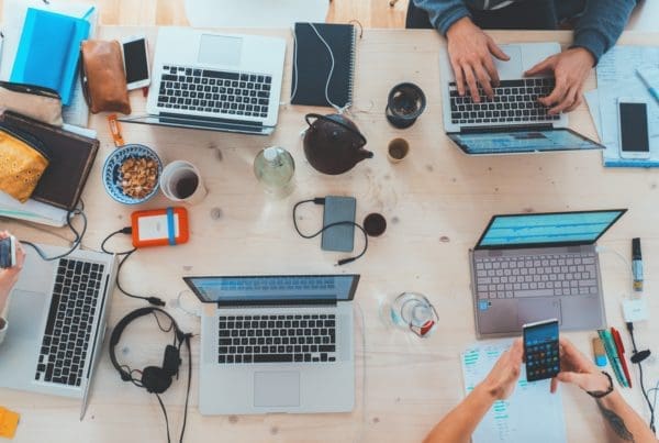People on computers and other technology